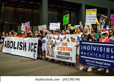 Downtown, Chicago-July 13, 2019: Protest Against ICE And Customs And Border Patrol Detention Centers. Front Line Marchers With Banners Supporting Immigration.