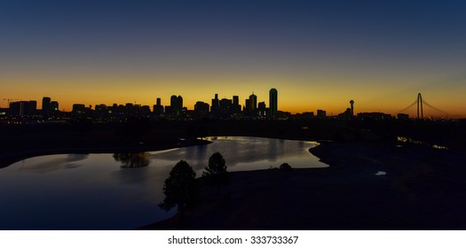 Downtown Dallas Skyline At Sunrise In Texas, USA From The Trinity River.