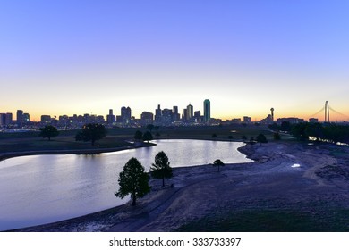 Downtown Dallas Skyline At Sunrise In Texas, USA From The Trinity River.