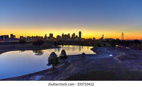 Downtown Dallas Skyline At Sunrise In Texas, USA From The Trinity River.