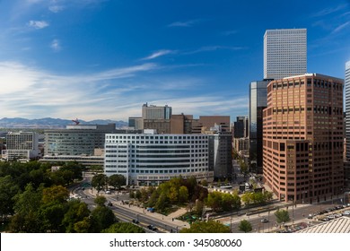 Downtown Denver With Close Up Of Skyscrapers And Blue Summer Sky