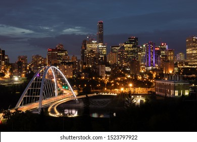 Downtown Edmonton at night, looking at the buildings and a bridge, long exposure