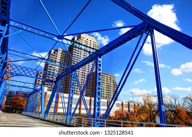 Downtown Grand Rapids Michigan, blue bridge looking up at buildings