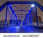 Downtown Grand Rapids at night, blue bridge fog, over the grand river