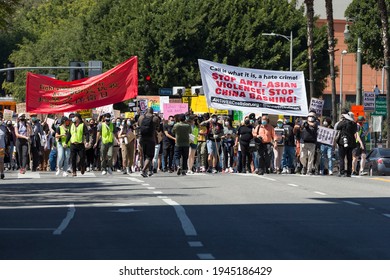 Downtown Los Angeles, California, USA - March 27, 2021 - Protestors March Down 1st Street Near City Hall In A National Day Of Action Demanding An End To Racism Against Asian-Americans