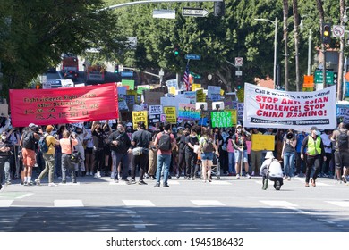 Downtown Los Angeles, California, USA - March 27, 2021 - Protestors March Down 1st Street Near City Hall In A National Day Of Action Demanding An End To Racism Against Asian-Americans