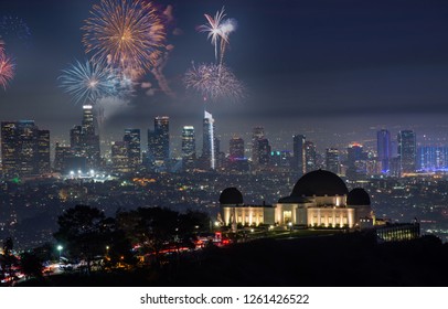 Downtown Los angeles cityscape with flashing fireworks celebrating New Year's Eve. - Powered by Shutterstock