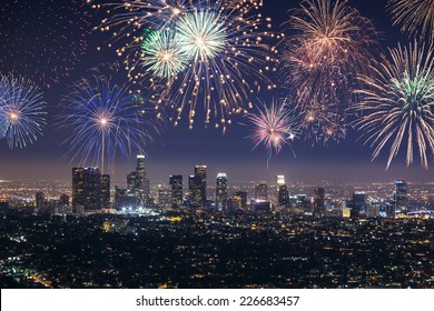 Downtown Los Angeles Cityscape With Flashing Fireworks Celebrating New Year's Eve.