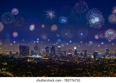 Downtown Los Angeles Cityscape With Flashing Fireworks Celebrating New Year's Eve.