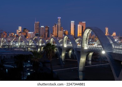 Downtown Los Angeles new 6th Street bridge at sunrise with city in background.