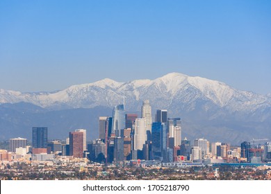 Downtown Los Angeles Skyline with Snow-capped Mountains - Panorama