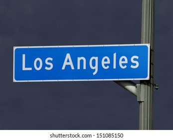 Downtown Los Angeles Street Sign With Dark Storm Sky.