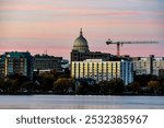 Downtown Madison and the Wisconsin State Capitol Building behind Lake Monona at Twilight