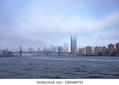 Downtown Manhattan Skyline And Manhattan Bridge Obscured In Fog                         