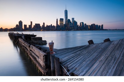 Downtown Manhattan Skyline At Sunrise As Seen From Jersey City