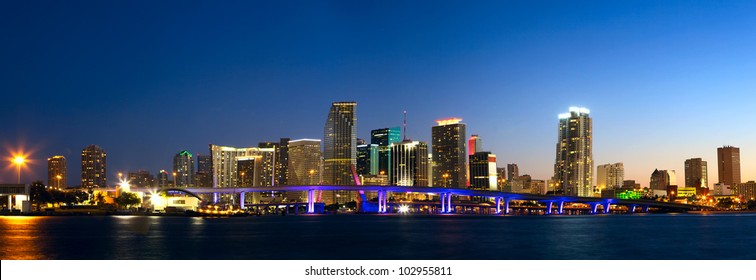 Downtown Miami Skyline Panorama And Biscayne Bay At Dusk