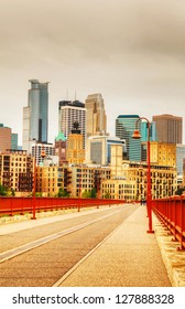 Downtown Minneapolis, Minnesota in the evening as seen from the famous stone arch bridge
