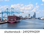 Downtown of Mobile, Alabama, USA and city docks as seeing from port harbour