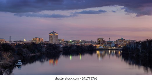 Downtown Montgomery And The Alabama River At Dusk In Montgomery, Alabama