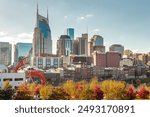 Downtown Nashville city skyline building view along the Cumberland River. Photo taken in Nashville Tennessee during a cloudy autumn day