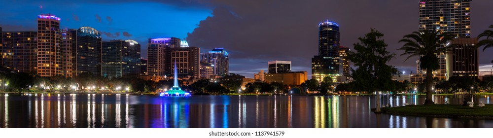 Downtown Orlando Skyline At Night At Lake Eola