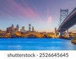 Downtown Philadelphia city skyline, cityscape of  Pennsylvania in USA with Ben Franklin Bridge at sunset