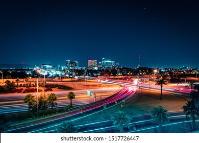 Downtown Phoenix, Arizona And Highway At Night