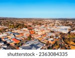 Downtown or rural regional town Armidale on highland plateau in Australia - aerial townscape.