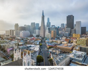 Downtown San Fransisco during a beautiful sunrise. Transamerica Pyramid and Salesforce Tower are in view above the rest of the sky scrapers. 