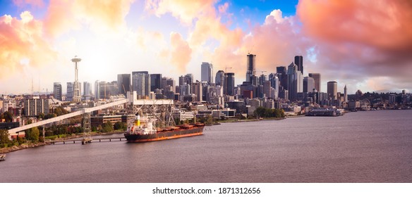 Centro de Seattle, Washington, Estados Unidos de América. Vista panorámica aérea de la ciudad moderna de la costa del Océano Pacífico. Dramático Sunrise Sky Art Render.