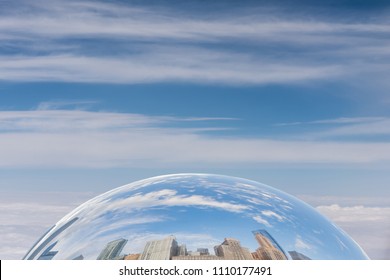 Downtown skyscrapers reflected in the mirror surface of The Bean sculpture in Millennium Park in Chicago, Illinois.  - Powered by Shutterstock