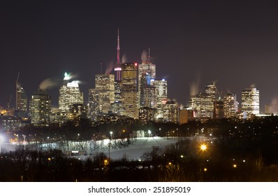 Downtown Toronto At Night In The Winter. Snow Can Be Seen