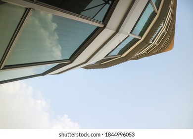 Down-view of a building with a sky background