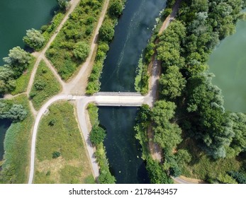 Downward Drone Shot Of River Path And Bridge In Hoddesdon