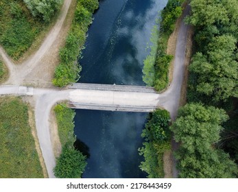 Downward Drone Shot Of River Path And Bridge In Hoddesdon UK