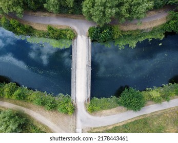 Downward Drone Shot Of River Path And Bridge In Hoddesdon UK