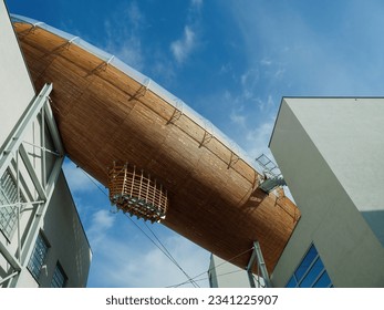 DOX Contemporary Art Center in Prague with the airship Gulliver, whose interior hides exhibition spaces, on a sunny day