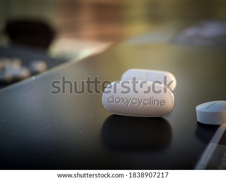 Doxycycline pill of broad spectrum tetracycline antibiotic used in treatment of infections caused by bacteria like pneumonia acne chlamydia