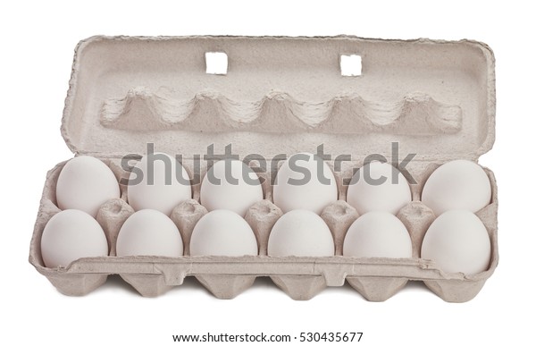 Dozen eggs\
in cardboard container isolated on\
white
