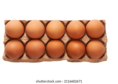 A Dozen Eggs On A Cardboard Stand On A White Isolated Background