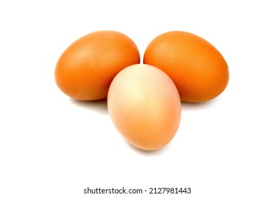 A Dozen Eggs On A White Background