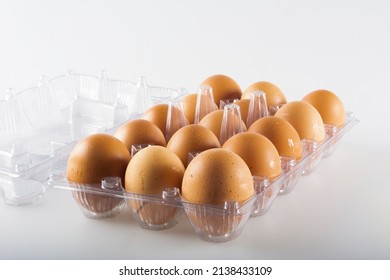 Dozen Eggs On White Background