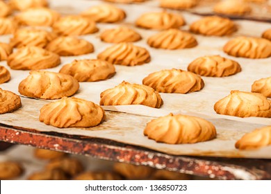 Dozens Of Swirly Cookies Cooling Off On A Bake Tray