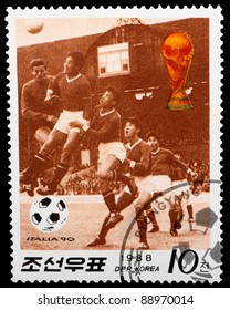 DPR KOREA - CIRCA 1988: A Stamp Printed By DPR KOREA Shows Football Players. World Football Cup In Italy, Series, Circa 1988