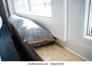Draft Excluder Under Window Blocking Cold Air From Traveling Around - Shutterstock ID 2066251967