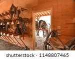 Draft and saddle horses in a ranch setting with natural scenery as backdrop. Iconic Western US imagery of cowboy settings photographed in Montana and Wyoming.