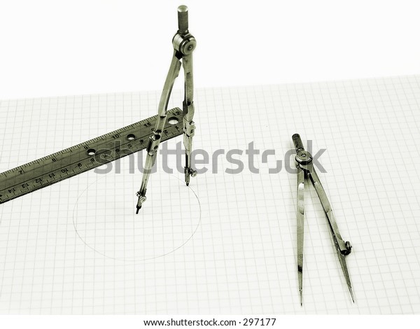 Drafting\
tools (circa 1930) on graph paper with a\
ruler