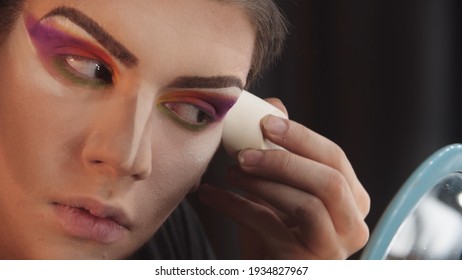 Drag Artist - Young Man Cleaning Out His Under Eyes With Applying White Powder Using A Sponge