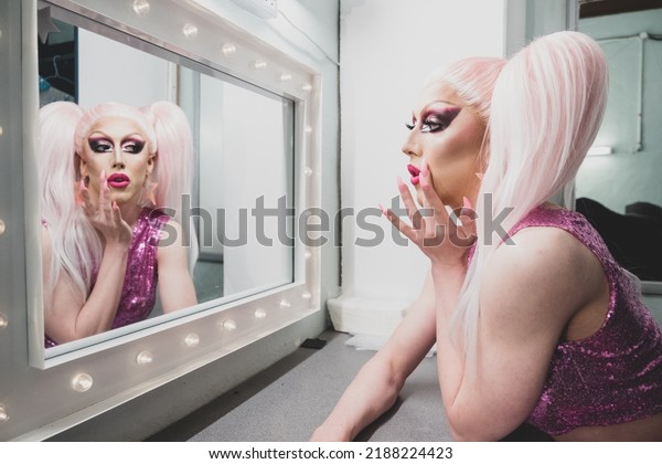 Drag Queen Getting Dressed Backstage before\
Performance in Dressing\
room
