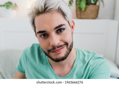 Drag Queen Looking At Camera Indoors At Home - Focus On Face